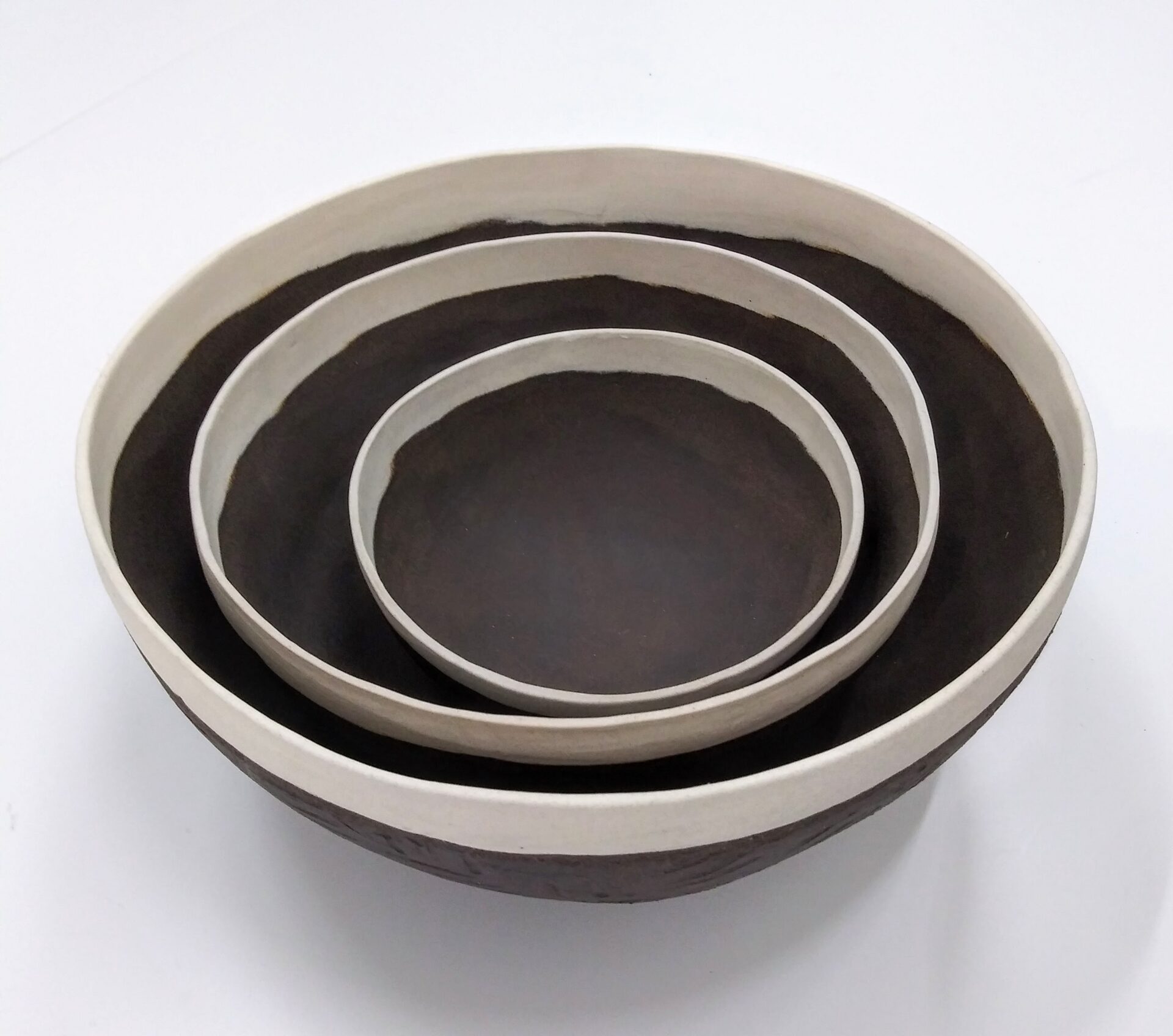 Ceramic art sculpture of three nested bowls